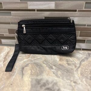 Lug black quilted wristlet.